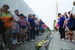 Vietnam Veterans Memorial, people, flowers, reflection, CONV02P13_02