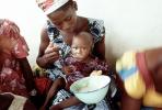 Mother Feeding a Child, Well Baby Clinic, FDJV01P02_06