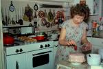 Woman Baking a Cake, Birthday, Stove, Utensils, Kitchen, Cupcakes, June 1973, 1970s, FDNV02P06_15