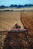 Harrow Disc Plow, Plowing, Tilling, Tractor, Rototill, Rotary-Till, Farmer, near Sacramento, California, USA, Dirt, soil, FMNV02P03_02.0839