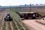 Tractor and Trailer harvesting Tomatoes, Sacramento River Delta, Central Valley, Dirt, soil, FMNV02P07_14