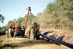 Crane, Tractor, Laying down Water Pipe, Pipline, Ditch, Africa, FWPV01P01_07