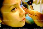 Woman gets an Eye Examination, HEOV01P01_18.0169
