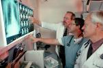 Doctors Looking at X-Ray, light box, Woman, Men, HHPV01P13_08