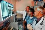 Doctors Looking at X-Ray, light box, Woman, Men, HHPV01P13_09