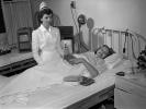 Nurse, Buck Teeth, Patient, resting, recuperating, 1940s, HHPV02P10_02