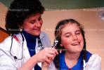 Doctor and girl patient, ear examination, otoscope, ear scope, Female, Woman, HODV01P07_17