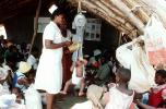 Nurse, Weighing a Toddler, Well Baby Clinic, Rushinga Zimbabwe, HOFV01P05_06