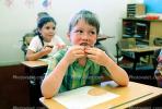 classroom, student, Boy, Male, Guy, cupcake, smiles, eating, Children Eating Lunch, desk, KEDV02P07_02