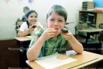 classroom, student, Boy, Male, Guy, cupcake, smiles, eating, Children Eating Lunch, desk, KEDV02P07_04
