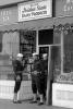 Soldiers guarding a store owned by Japanese, right after Pearl Harbor, WW2, World War-II, WWII, USN, United States Navy, Internment, 1942, 1940s, MYNV18P04_17B