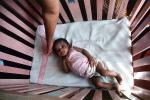 Girl in a crib, newborn, PABV02P03_10