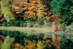Woman sits over a Reflecting Pond, Fall Colors, New Hampshire, 1950s, autumn, PBAV02P09_19