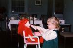 Girl Bottle Feeding her redhead doll, Toddler, 1950s, PCDV02P04_15