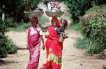 Woman Carrying a Balanced Tub on their head, Boral Village, Gujarat, PDCV01P03_05