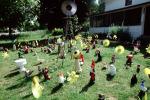frontyard full of figurines, elfs, cats, mother goose, front yard, PDEV01P04_14