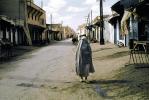 Woman Walking, Dirt Road, unpaved, Burka, Medina Marrakech, 1952, 1950s, PFSV05P07_11