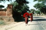 Monks Walking down the street, Bagan, Myanmar, PFSV06P04_02