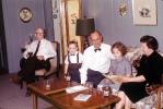Family, Reading, Mom, Dad, Bowtie, Grandpa, son, sofa, daughter, reading,  1940s, 1940s, PHCV02P11_05