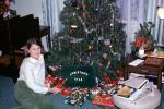 girl, smiles, tree, Presents, Decorations, Ornaments, Christmas Tree decorated, 1968, 1960s, PHCV02P12_07