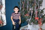 boy, cowboy, smiles, tree, tinsel, Decorations, Ornaments, Christmas Tree decorated, 1950s, PHCV03P05_09