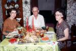 Christmas Dinner, turkey, table, plates, candles, 1950s, PHCV03P07_15