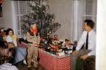 tiny tree, girl, boy, oiler, toy train, oilcan, village, Presents, Decorations, Ornaments, 1950s, PHCV03P08_08