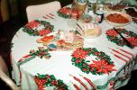 Dinner, table setting, wreath, bells, cookies, gingerbread men, tablecloth, 1950s, PHCV03P10_03