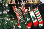 stuffed stockings, Mary, John, Mom, Jari, Dad, Tree, 1950s, PHCV03P15_09