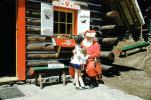 Santa Claus, Log Cabin, girl, building, 1950s, PHCV04P02_18