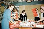 wrapping presents, women, fun, funny, party, 1950s, PHCV04P05_14