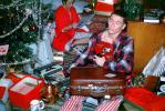 Christmas Tree, Presents, suitcase, typewriter, unwrapping presents, 1960s, PHCV04P10_18