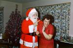 Santa Claus Scolds Mom, laughing, funny, finger pointing, 1950s, PHCV04P12_15