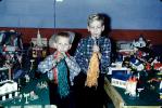 Boys, toy trainset, toot horns, 1950s, PHCV04P13_13