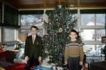 Boys, new sweater, decorated tree, brothers, 1950s, PHCV05P04_05