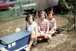 backyard train, Girls, Miniature Train, Riding, smiles, smiling, cute, Akron Ohio, September 1959, 1950s, PLGV03P11_04