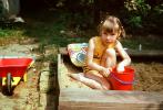 Sand Box, Pail, Wheelbarrow, Girl, Backyard, 1960s, PLGV03P12_04