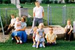 Backyard, sandbox, boys, girls, slide, July 1958, 1950s, PLGV03P14_19B