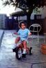 Tricycle, Girl, Legs, Backyard, July 1971, 1970s, PLGV03P15_02