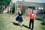 Backyard, boy, girl, dress, dressy, formal, April 1960, 1960s, PLGV03P15_06