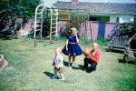 Girl, boys, ball, formal dress, Backyard, April 1960, 1960s, PLGV03P15_08
