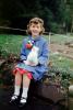Girl, Smiles, Coat, Socks, Shoes, Sitting, Bunny, Glen Rock New Jersey, April 1952, 1950s, PLPV01P01_06