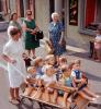 Nurse Maid, cart full of kids, boys, girls, barefeet, barefoot, Hergiswil Switzerland, August 1970, 1970s, PLPV01P06_16