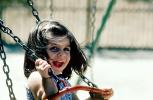 Girl on a swing, smiles, joy, PLPV01P08_18