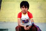 Boy Sitting on a sidewalk, Colonia Flores Magone, PLPV06P08_15