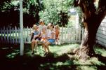Children Sitting on a Backyard Swing, Girls, cute, funny, 1960s, PLPV15P09_13