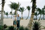 Beach, Palm Trees, parents, son, mother, father, 1950s, PORV26P09_10