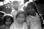 Girls, smiles, pigtails, nosering, slum, Mumbai, India, POVPCD3306_064