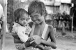 boys, brothers, smiles, slum, Mumbai, India, POVPCD3306_074B