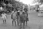 Girl smiles, boy smiling, shanty town, slum, Mumbai, India, POVPCD3306_092